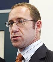 Andrew Little ... climate in the background.