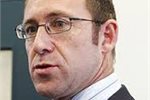 Andrew Little ... climate in the background. Andrew Little ... climate in the background.