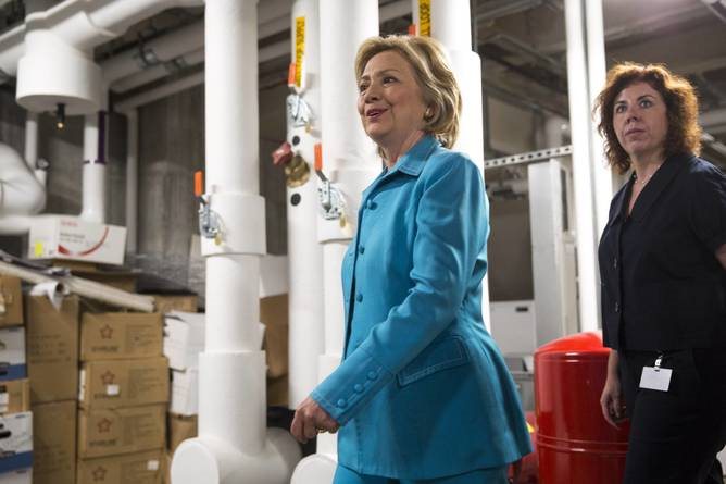 Clinton a day after releasing her energy and climate plan at LEED-certified, energy-efficient bus station in Des Moines, Iowa.