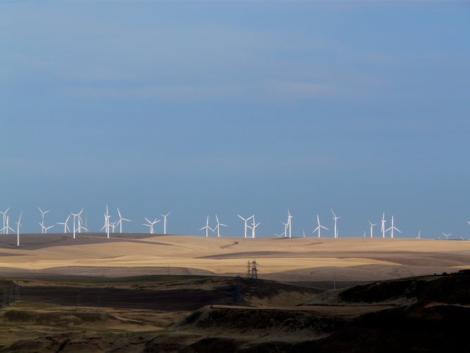 Lots of wind blowing – often at night when there’s little demand for power.