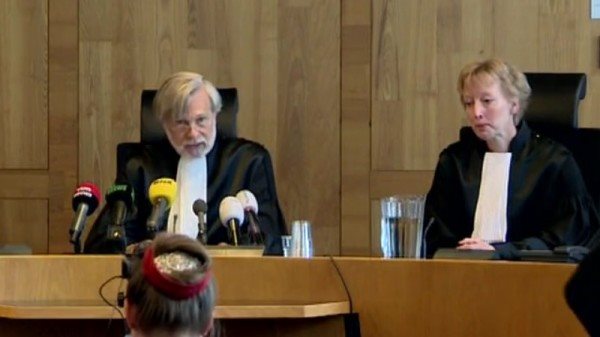 Dutch judges deliver their decision.