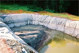 The pits ... hydro-fracking waste-water pit containing toxic contaminants.