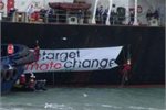 Greenpeace protesters unfurl a banner on the Hellenic Sea bulk carrier.. protests have cost Solid Energy tens of millions Greenpeace protesters unfurl a banner on the Hellenic Sea bulk carrier.. protests have cost Solid Energy tens of millions