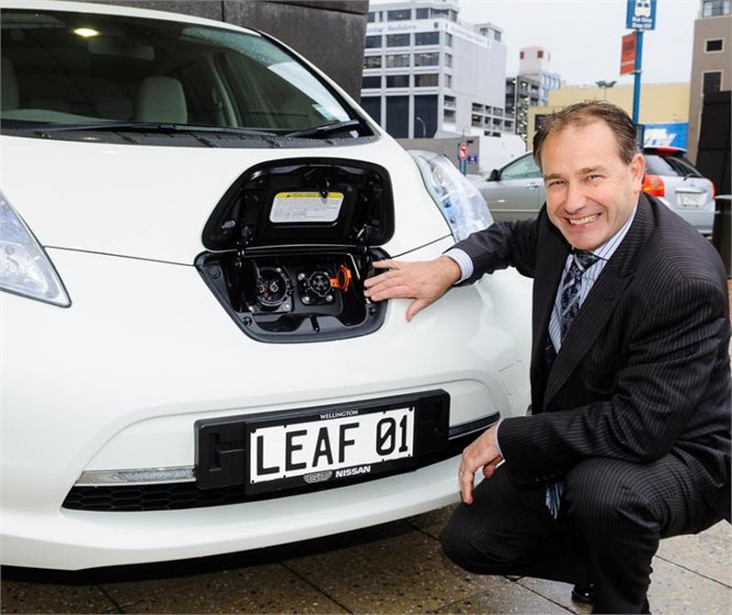 Phil Heatley checks out the Leaf's recharging unit.