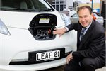 Phil Heatley checks out the Leaf's recharging unit. Phil Heatley checks out the Leaf's recharging unit.