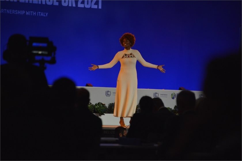 Delegates are treated to a poem during the opening ceremony