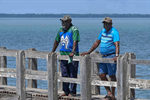 Paul Kabai and Pabai Pabai on the boardwalk in Boigu. Paul Kabai and Pabai Pabai on the boardwalk in Boigu.