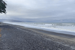 The new bund is providing some protection to Amberley Beach residents for now. The new bund is providing some protection to Amberley Beach residents for now.