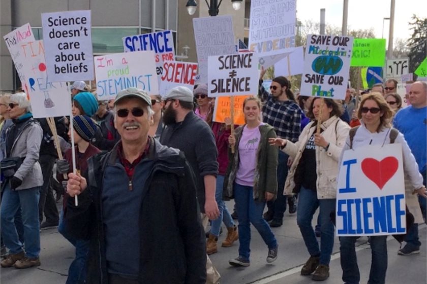 Kevin Trenberth protesting against Trump in April 2017.