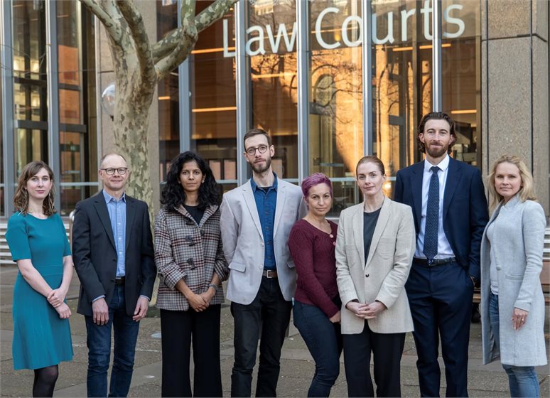Members of the Parents for Climate group, and lawyer David Hertzberg, outside the federal court in Sydney. The advocacy group accused Energy Australia of greenwashing. The parties have now agreed to a settlement.