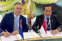 Watts with Indonesia’s Minister Hanif at COP31, signing off on joint intentions to cooperate on climate change.