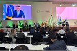 Climate Change Minister Simon Watts onstage at the COP climate summit in Brazil this week