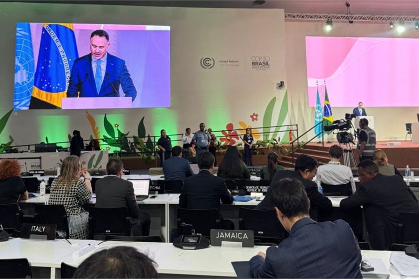 Climate Change Minister Simon Watts onstage at the COP climate summit in Brazil this week
