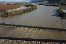 The Wairau River during the July 2025 flood event. Minor damage from the June flooding was made worse by more flooding two weeks later.