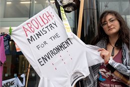 Protestor outside Wellington High Court on Monday