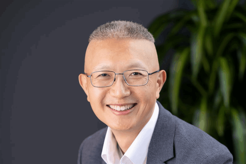 Dr Manbo He, Professor of Finance at University Canada West and Adjunct Professor of Sustainable Finance at Griffith Business School