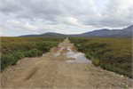 Melting permafrost has made this Alaskan road sink by 10 feet Melting permafrost has made this Alaskan road sink by 10 feet