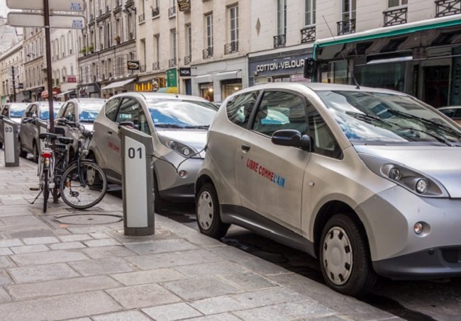 A line of electric cars ready to be driven in a sharing scheme in Paris.